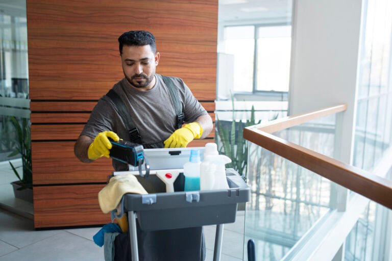 medium-shot-man-walking-with-cleaning-cart